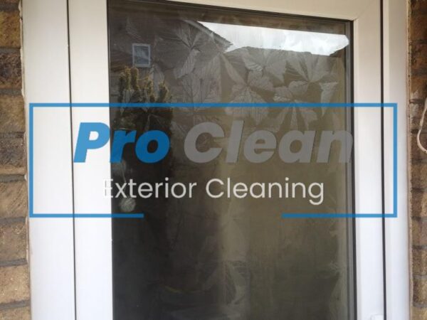 Pro Clean team performing streak-free domestic window cleaning on a home in Cannock using water-fed poles