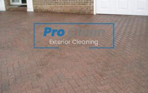 Pro Clean team performing deep drive cleaning in Cannock, removing grime and stains from block paving and concrete surfaces