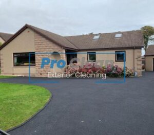 Pro Clean team restoring and cleaning a tarmac driveway in Cannock, bringing it back to its original black finish